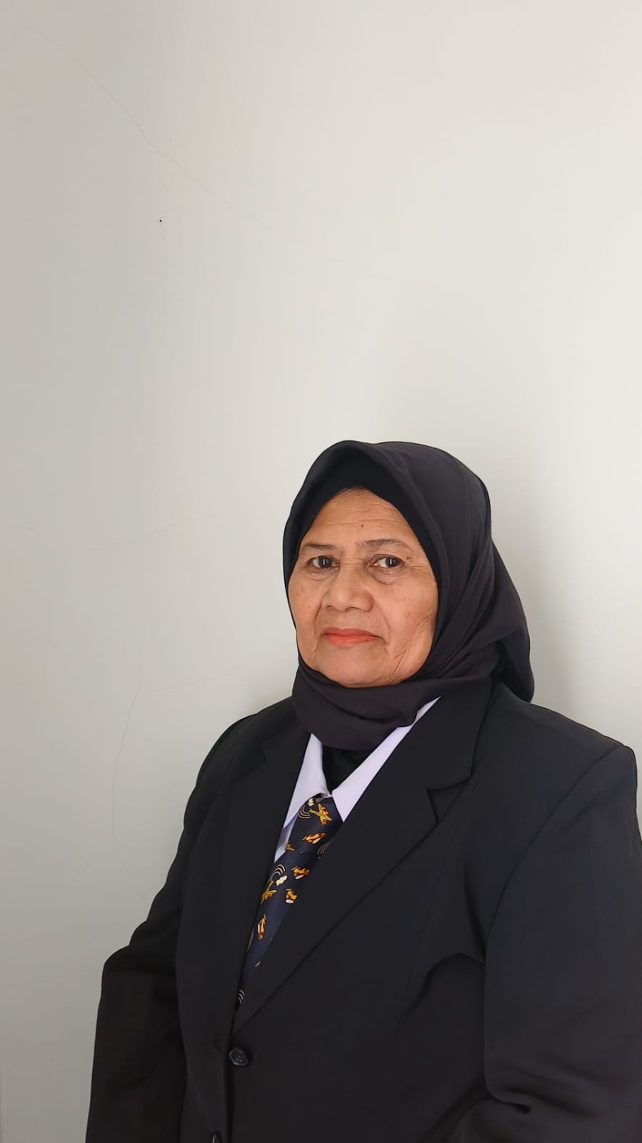 Prof. Dr.Hj. St. Halimang, M.H.I